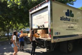 Hawaiian volunteers delivering food to partner agency.