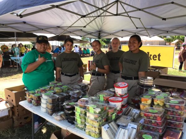 Hawaiian Volunteers serving food at Hawaiian Volunteers delivering at a Recipient Agency.